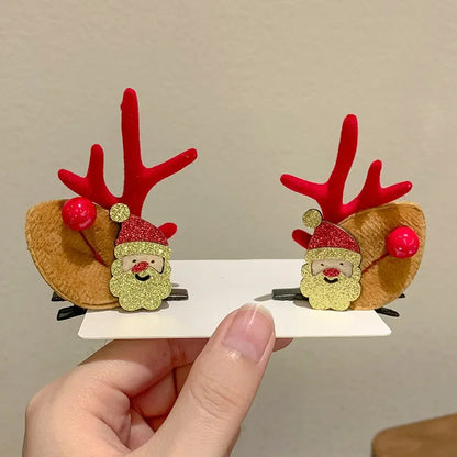 Christmas reindeer ear clips with santa